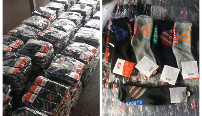 Bunuri contrafăcute, în valoare de peste 440.000 lei, confiscate în Portul Constanța Sud Agigea - 011101-1541062015.jpg