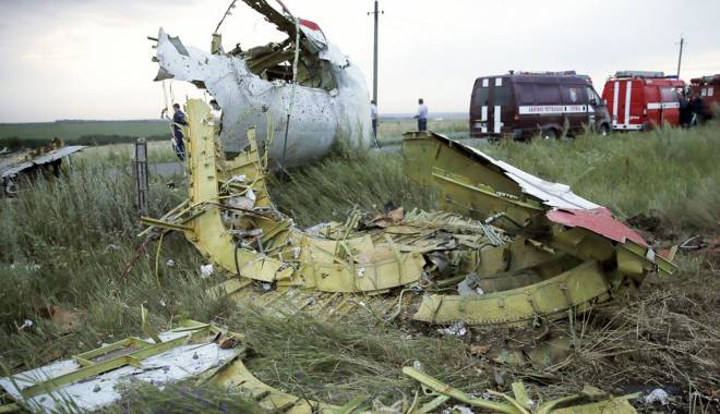 MH17: Noi rămășițe umane au fost descoperite la locul prăbușirii avionului, în UCRAINA - 120-1415777901.jpg
