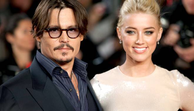 Johnny Depp și Amber Heard, la un pas de divorț? - 1389969512johnnydeppamberheardzo-1430821298.jpg