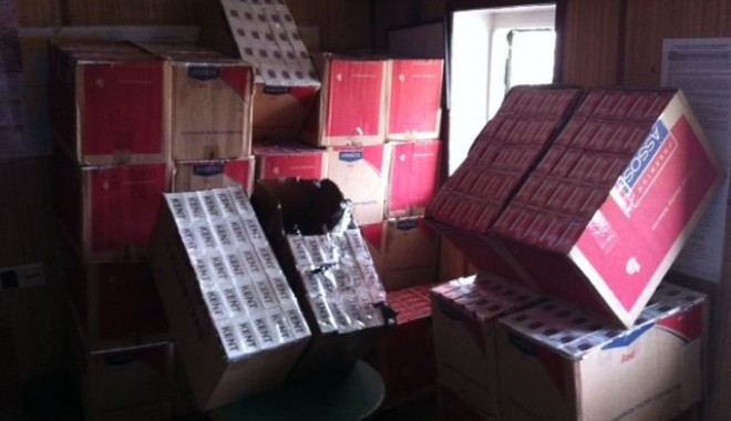 PERCHEZIȚII LA CONTRABANDIȘTII DE ȚIGĂRI / Au fost confiscate zeci de mii de pachete de țigări, mașini și valută - 15februarieperchezitiitigari-1360917055.jpg