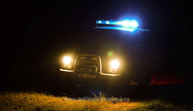 Doi cetățeni români, arestați pentru trafic de migranți