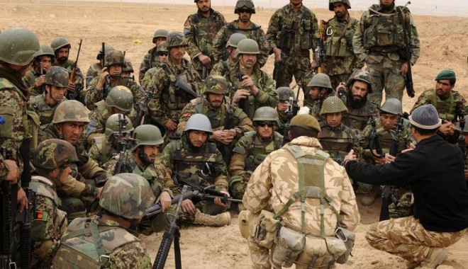 O fetiță de 8 ani din Afganistan a fost prinsă purtând o vestă cu explozibili - 197447017875781-1389092044.jpg