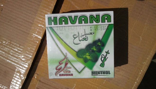 Peste două tone de tutun de contrabandă descoperite într-un container - 20120505115425-1336463683.jpg