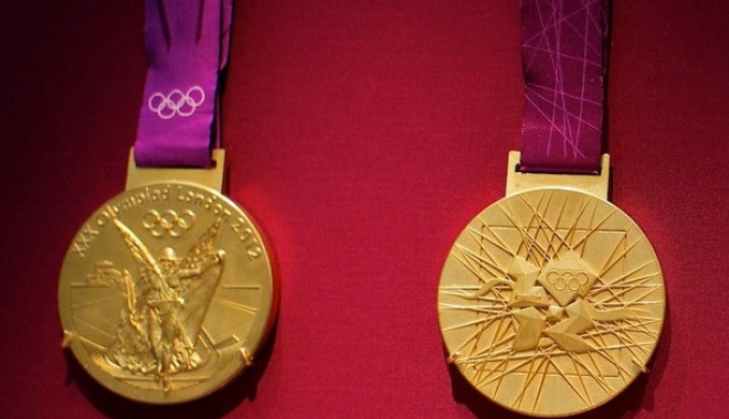 Un fost sportiv a returnat medalia olimpică de aur ca protest față de excluderea luptelor de la JO - 2012summerolympicsgoldmedal-1361381748.jpg
