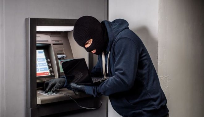 Poliţia Română, cooperare cu FBI, pentru destructurarea unei grupări specializate în skimming - 20220302caramengamankantransaksi-1706609406.jpg