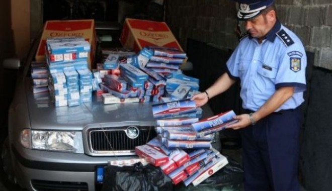 Țigări și alcool confiscate de polițiști - 20martietigarisialcool-1395327666.jpg