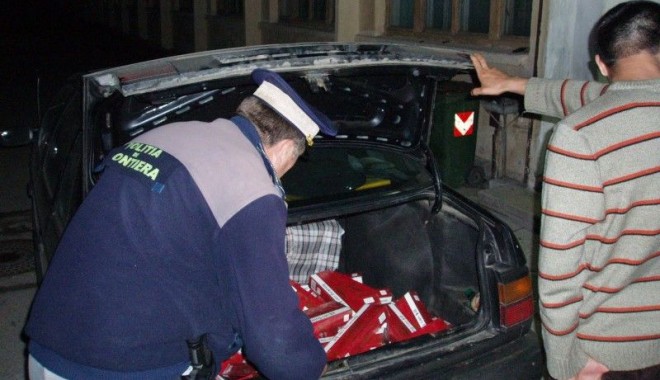 Sute de pachete de țigări de contrabandă, confiscate - 22augusttigaricontrabandagarda-1408710883.jpg