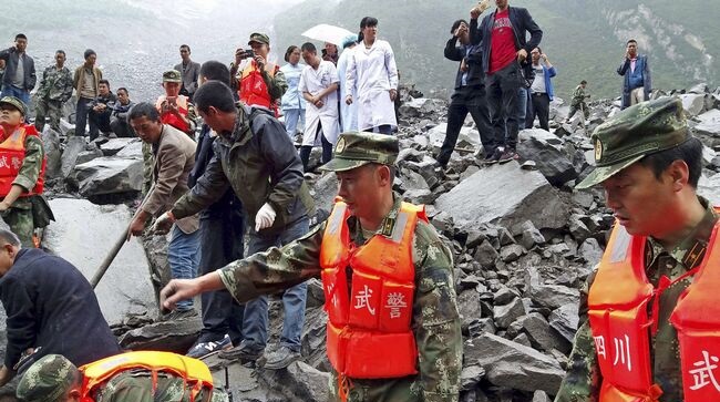 Alunecare de teren în China / Peste 120 de dispăruți. Cinci cadavre, recuperate - 252-1498308637.jpg