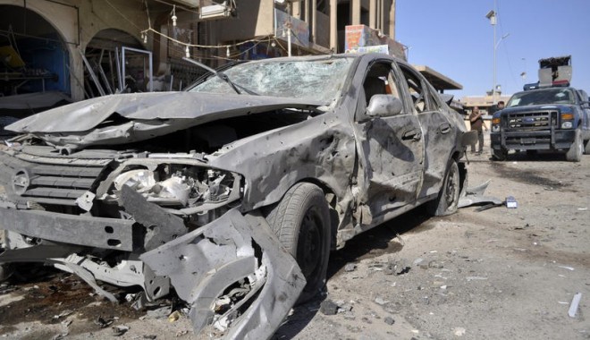 Carnagiu în Irak: Nouă mașini-capcană au explodat, astăzi, la Bagdad - 298024exploziemasinairakap-1375091681.jpg