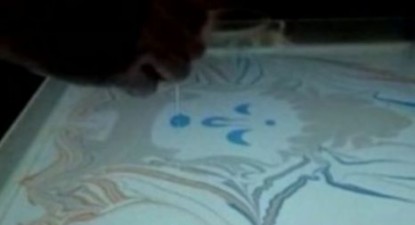 Un artist chinez pictează pe apă - 4af0e3f08d279f5e0fa660bc86b70c78.jpg