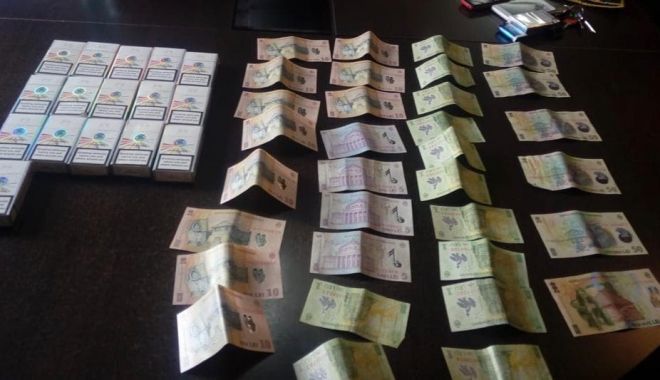 Prins de polițiști în timp ce vindea țăgări de contrabandă, la Constanța - 51360194227366258599125979256070-1549540530.jpg