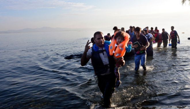POVESTE TRISTĂ! Zeci de migranți cu copii, salvați în ultima clipă pe mare - 61706929-1545823582.jpg