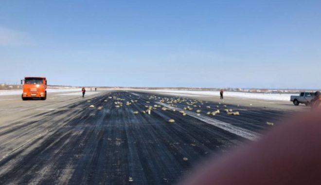 Ploaie cu diamante și lingouri de aur, în apropierea aeroportului - 61946892-1521186087.jpg