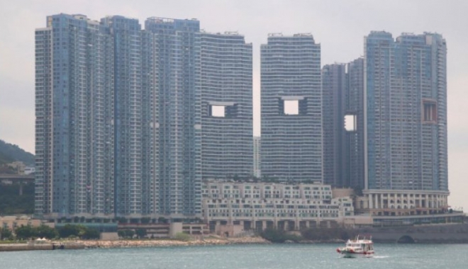 Motivul neobișnuit pentru care zgârie-norii din Hong Kong au găuri în ei - 61ab59db58ece9131caf2a95a2d5a6e6-1512460021.jpg