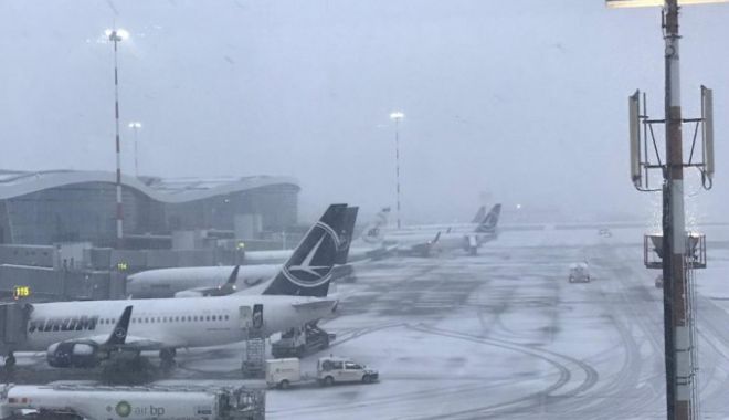 Întârzieri pe Aeroportul Otopeni din cauza viscolului. Mai multe zboruri afectate - 62004503-1544859482.jpg