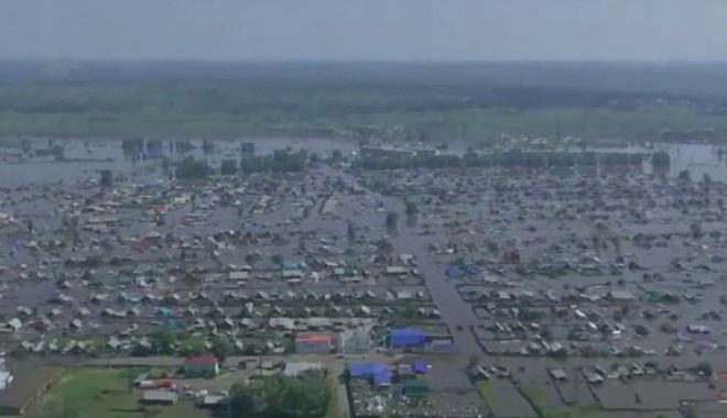 Siberia, lovită de un adevărat potop. Zeci de localități sunt sub ape - 62058478-1561887138.jpg