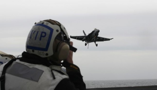 Aviația militară siriană a efectuat raiduri aeriene în vestul Irakului. Zeci de civili au murit, sute sunt răniți - 646x404-1403707907.jpg