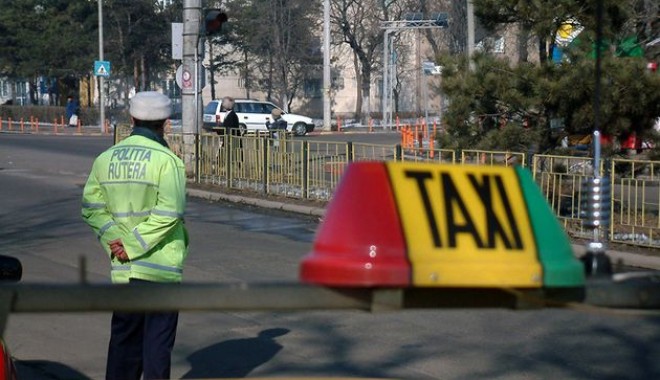 Taximetrist bișnițar de țigări, în plasa polițiștilor - 6maitigariintaxi-1399374477.jpg