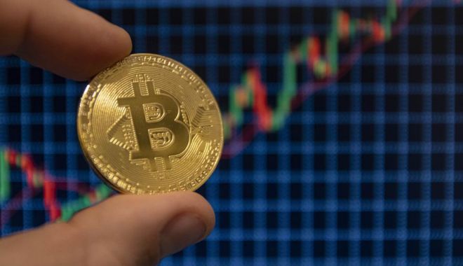 Bitcoin a depăşit pentru prima dată plafonul de 25.000 de dolari - 960x0-1608999612.jpg