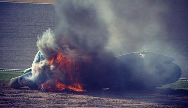 Accident grav la MotoGP. A luat foc pe pistă! - accident-1411737275.jpg