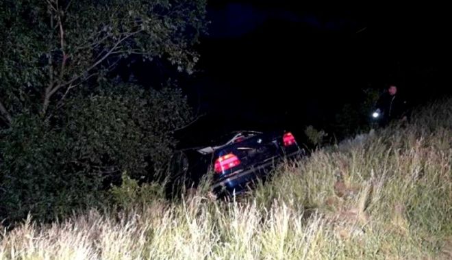 Unul dintre tinerii care au plonjat cu mașina în apă, reținut. El s-ar fi aflat la volan, și nu una dintre fetele care au murit - accidentlaculghiorocarad1-1527677154.jpg