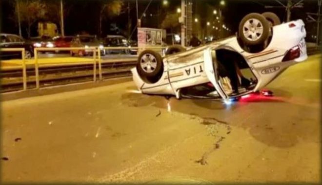 Mașină de poliție, în misiune, răsturnată, după ce un șofer nu i-a acordat prioritate - accidentmasinapolitie90959000-1552292252.jpg