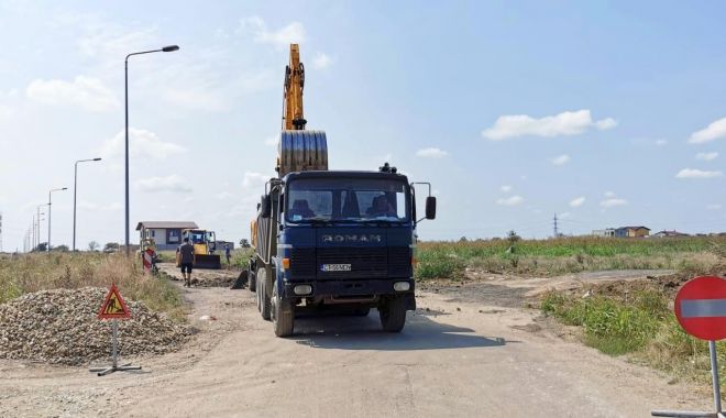 A început asfaltarea străzii de pământ Prelungirea Meșterul Manole, din cartierul Km 5 - ainceputasfaltarea-1595354653.jpg