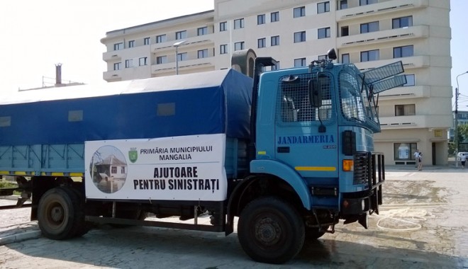 Ajutoarele din Mangalia  au ajuns la sinistrații din județul Olt - ajutoaredinmangaliaauajunslasini-1408030943.jpg