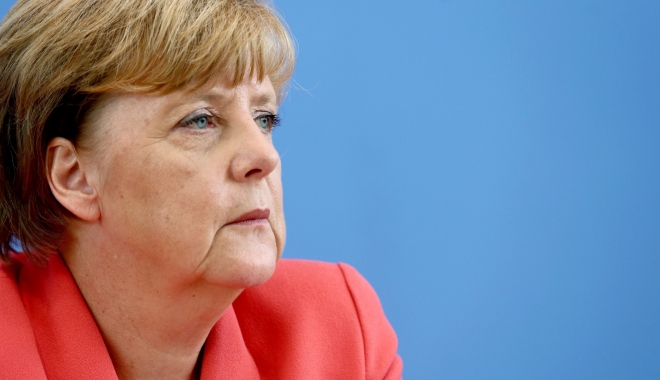 Angela Merkel îi îndeamnă pe cei cu origini turce să nu aducă în Germania conflictele din Turcia - angelamerkel-1472411476.jpg
