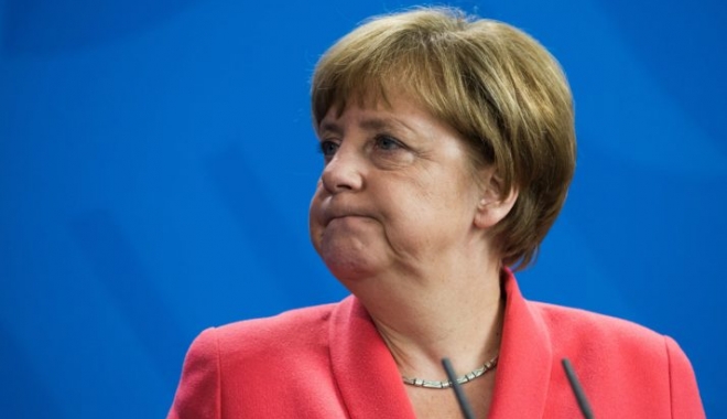 Angela Merkel nu regretă politica sa privind refugiații, în pofida costurilor politice - angelamerkel-1503862875.jpg