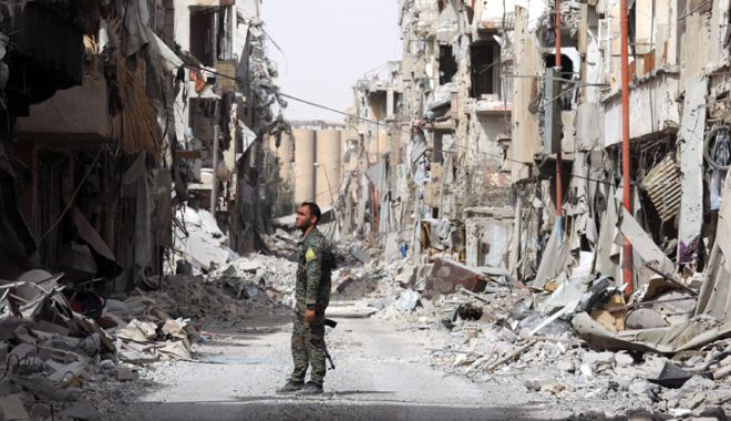 Atacurile coaliției asupra Raqqa ar fi încălcat legislația internațională - atacurile-1528206935.jpg