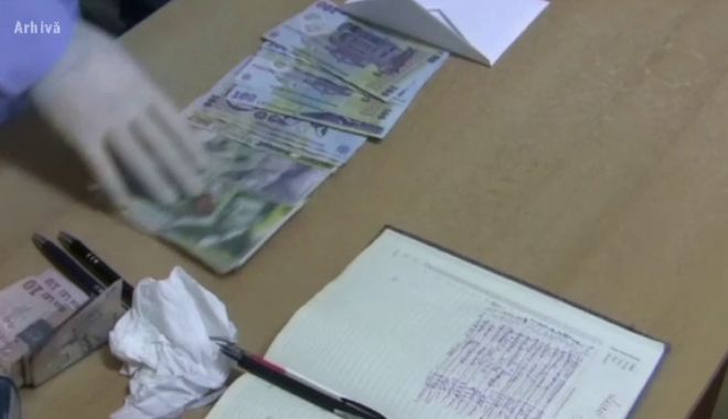​O femeie a oferit 10.000 de lei mită unui polițist: 