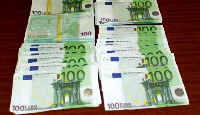 Suma uriașă de bani falși găsită de DIICOT în locuințele mai multor români - bani-1611838522.jpg