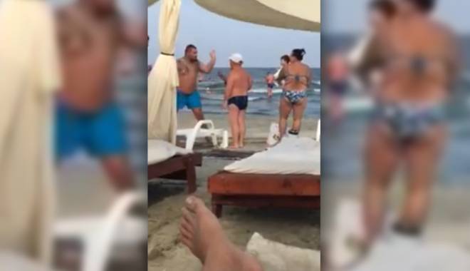 VIDEO. Turistă bătută pe plajă pentru că nu a vrut să își ia sezlong / Cu ce amendă s-a ales bătăușul. UPDATE - bataie1439826324-1439885423.jpg