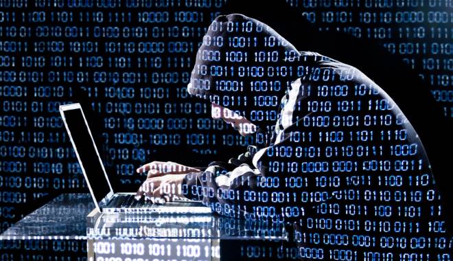 Hackeri afiliați Statului Islamic amenință familia Obama - bigstockhackertypingonalaptop445-1423642051.jpg