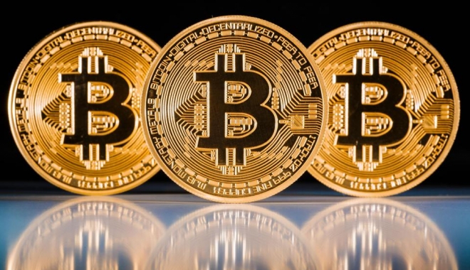 Bitcoin, la un nou record. Se apropie de 18.000 de dolari - bit-1513421083.jpg