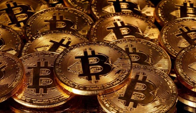 Bitcoin a depășit 28.000 de dolari și nu dă semne de încetinire - bitcoin-1609150056.jpg