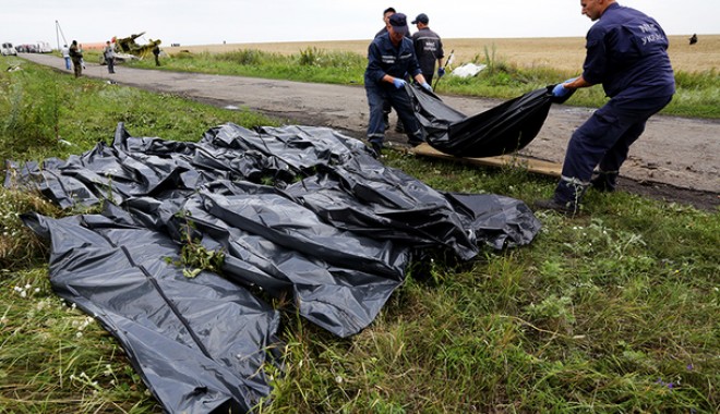 Zborul MH17: Trenul cu trupurile neînsuflețite ale victimelor a ajuns la Harkov - cadavrea-1406027179.jpg