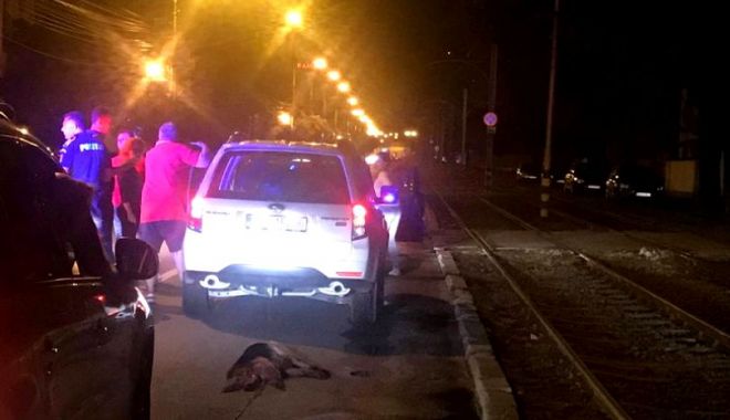 SCENE REVOLTĂTOARE! Câine legat de mașină și târât prin trafic - cainelegatdemasinasitaratprintra-1528097308.jpg