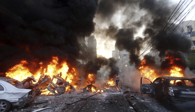 Un nou atentat terorist zguduie lumea. Trei kamikaze s-au detonat lângă un tribunal - carbombexplosioninhar014-1487664435.jpg