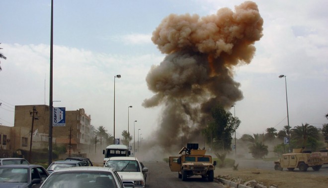 Carnagiu în Siria. 39 morți, printre care 30 de copii, în dublul atentat de la Homs - carbombiniraq-1412241935.jpg