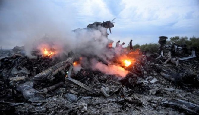 Numele și fotografiile victimelor tragediei din Ucraina, exploatate de escroci pe Facebook - catastrofadinucrainacineesteroma-1405949359.jpg