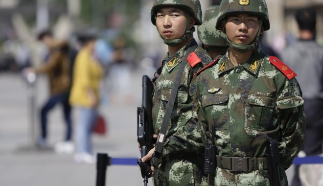 Atac armat în China. Două persoane, printre care și primarul, au fost rănite - chinesepolicewillsoonpatrolthest-1483526338.jpg