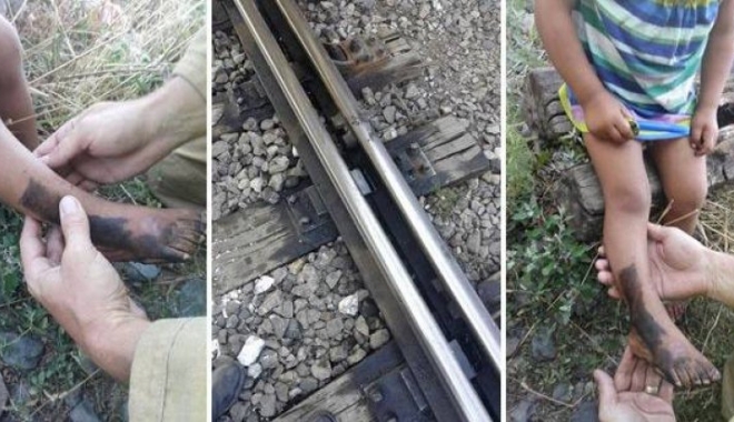 MOMENTE DE GROAZĂ DUPĂ CE UN COPIL A RĂMAS CU PICIORUL PRINS ÎNTRE ȘINELE DE CALE FERATĂ - copilblocatsinecolaj702x33687092-1502452649.jpg