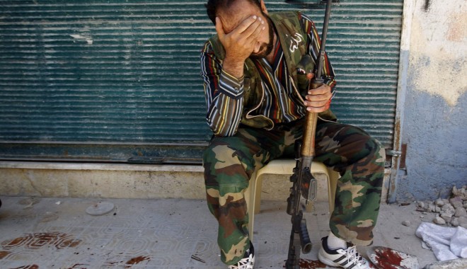 12 civili, uciși prin tortură  la închisoare  în Siria - crima-1362112975.jpg