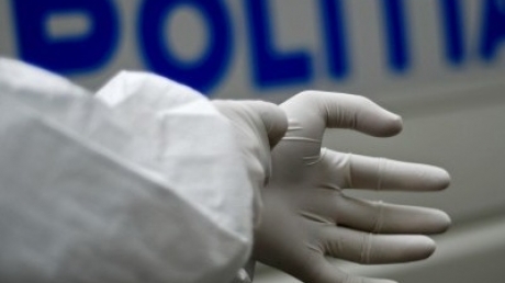 Un om de afaceri a fost găsit mort în vila sa - criminalisti86784900-1313038233.jpg