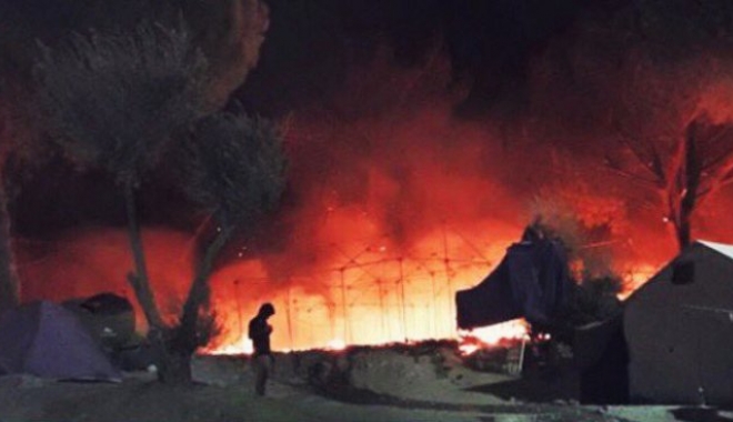 Tabără de refugiați, incendiată. Peste 3.000 de migranți au fost evacuați - csvb8gzumaa2vxb59321200-1474354585.jpg