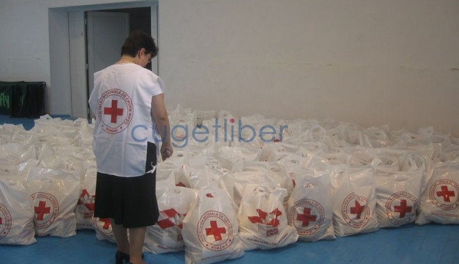 Aproape 200.000 de kg de alimente, distribuite de Crucea Roșie prin Banca de alimente - cuget-1362660810.jpg