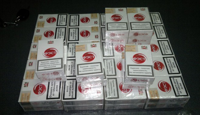 Cum sunt aduse în Constanța țigările de contrabandă din Belarus - cumsuntaduseinconstantatigaridec-1409764984.jpg