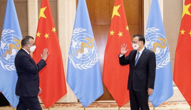 Directorul general al OMS îi cere premierului chinez o colaborare mai puternică în legătură cu originea coronavirusului - directorul-1644160829.jpg